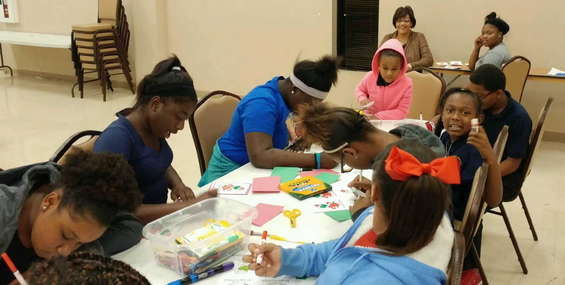 Young boys and girls doing an arts-and-crafts activity